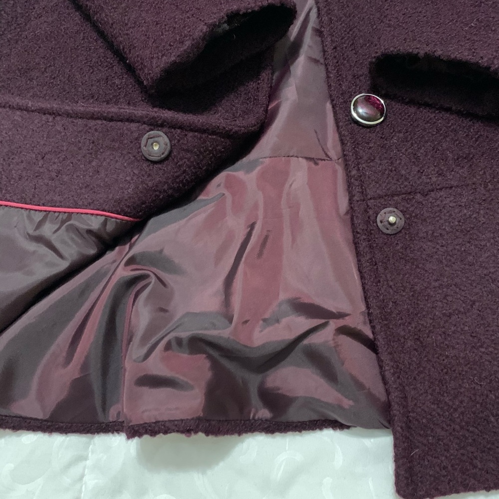 Plum winter coat with flounce
